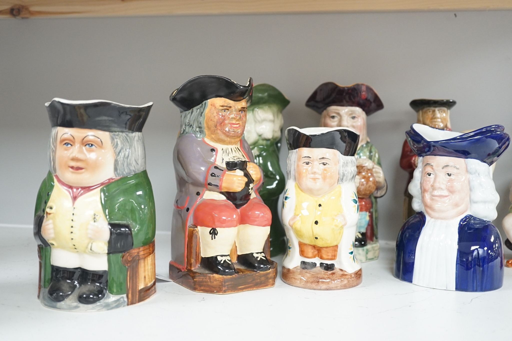 Eleven various pottery Toby jugs- 1 musical